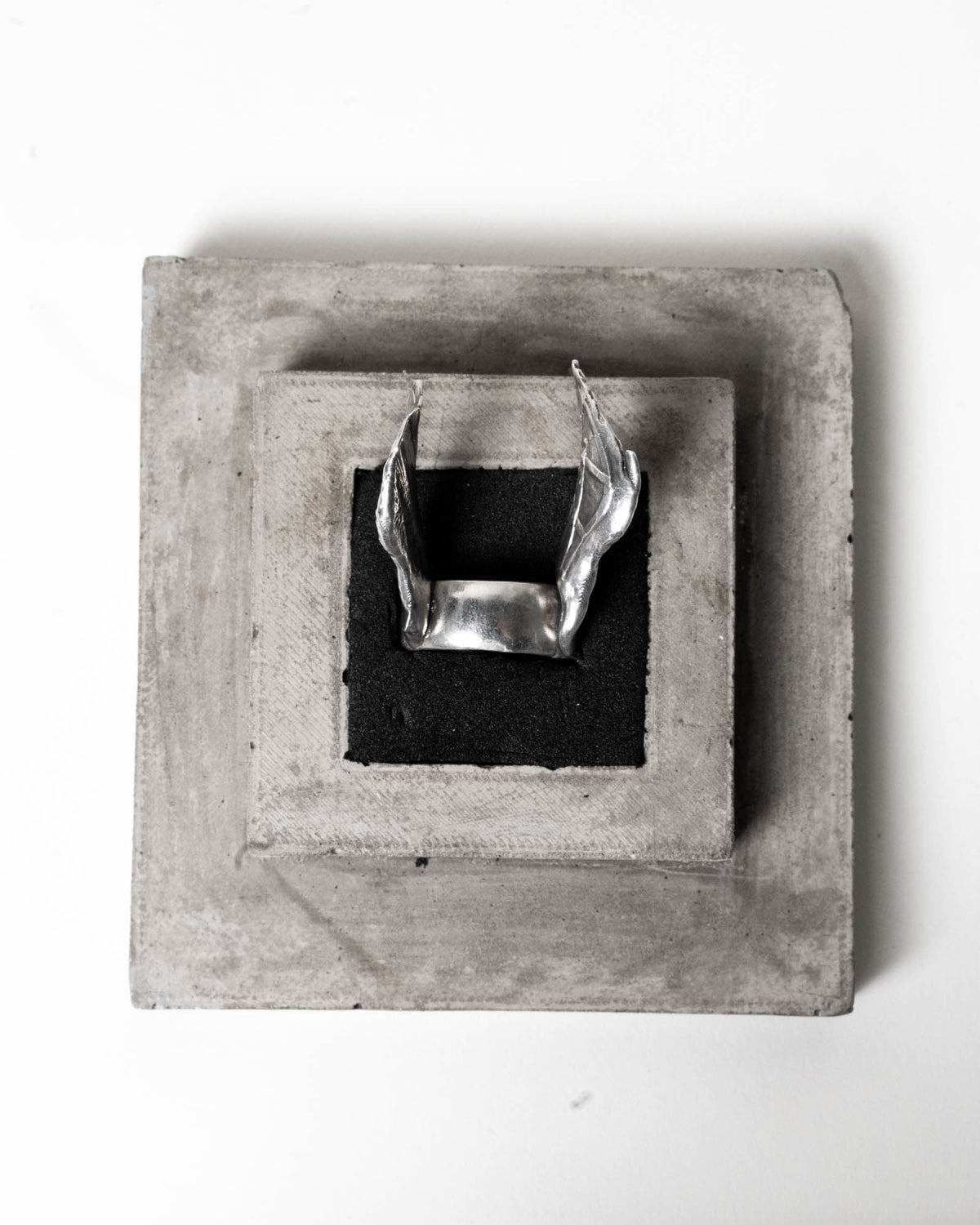 Goddess Nike Ring Sterling Silver in its concrete packaging