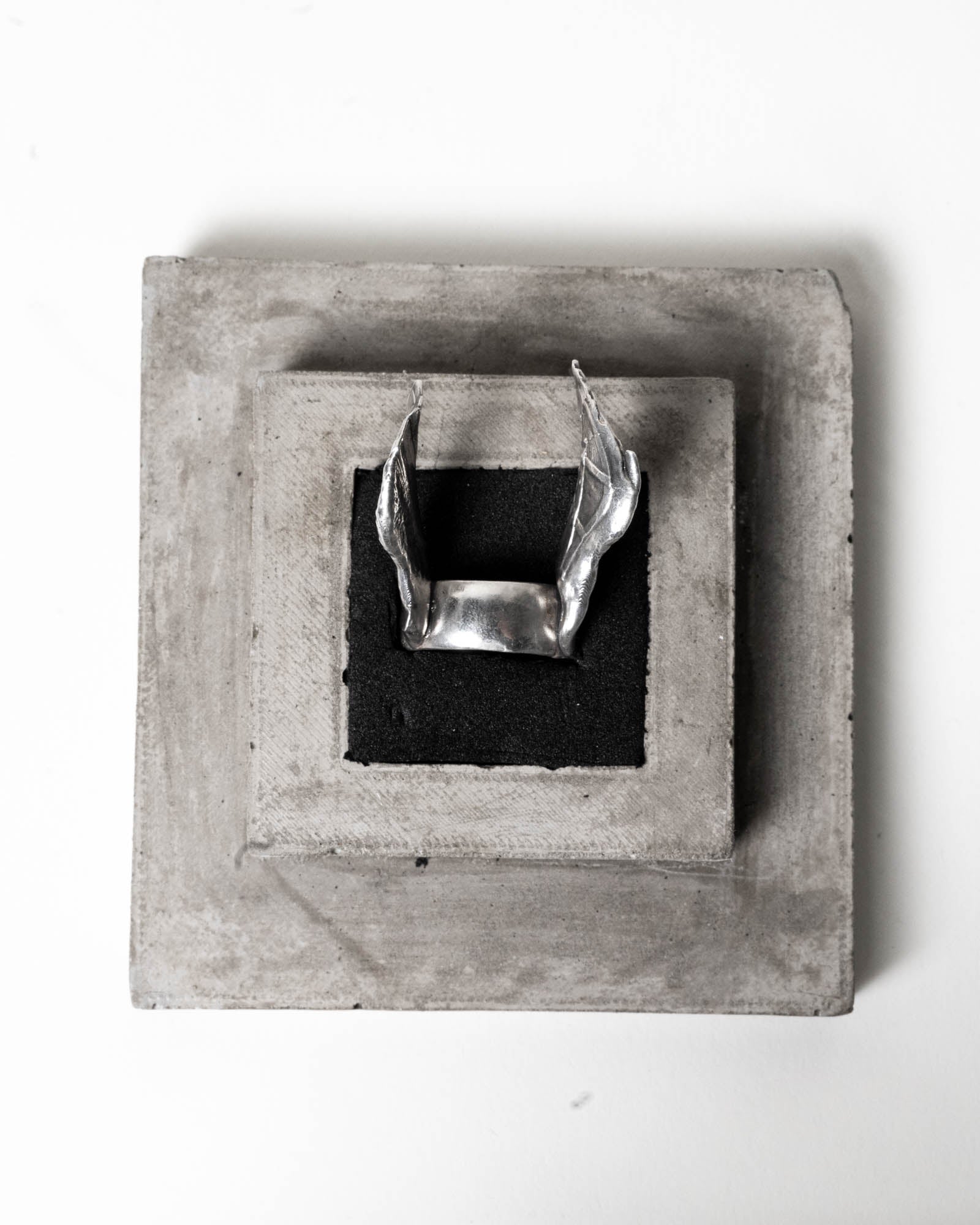 Goddess Nike Ring Sterling Silver in its concrete packaging