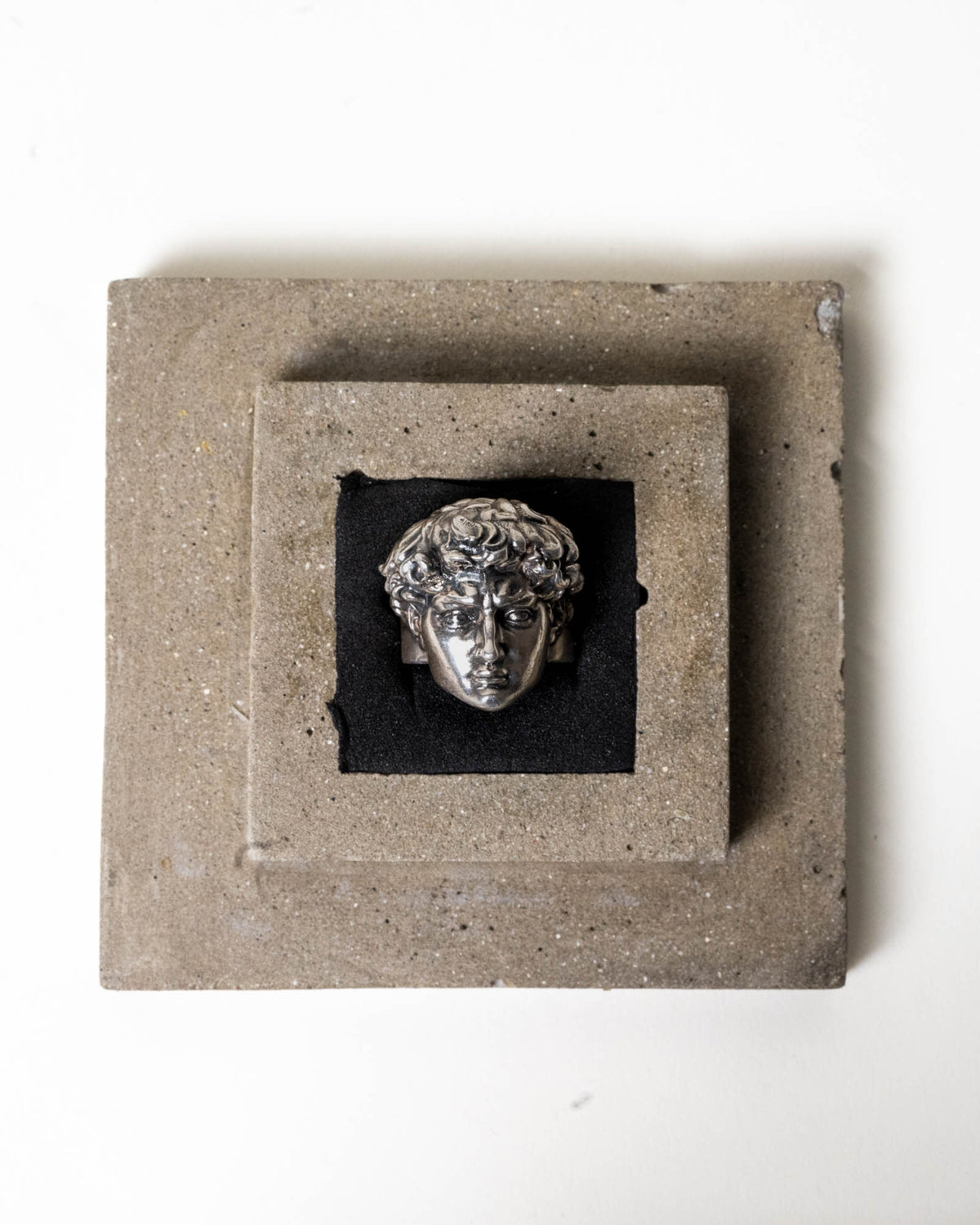Michelangelo's David Ring Sterling Silver on top of it's package